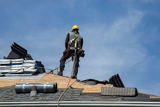 Professional Roof Replacement technician working in Gosport, IN